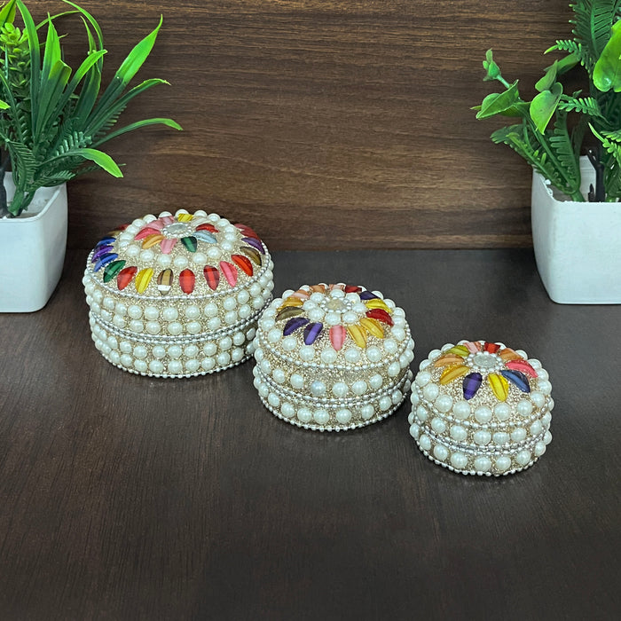 Handcrafted pearl-studded sindoor box set with colorful beads, set of 3 for home and temple décor.