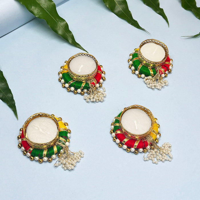 Traditional pooja essentials candle holders with intricate detailing