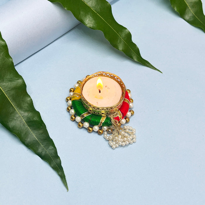 Decorative tealight holders with beads and vibrant festive colors