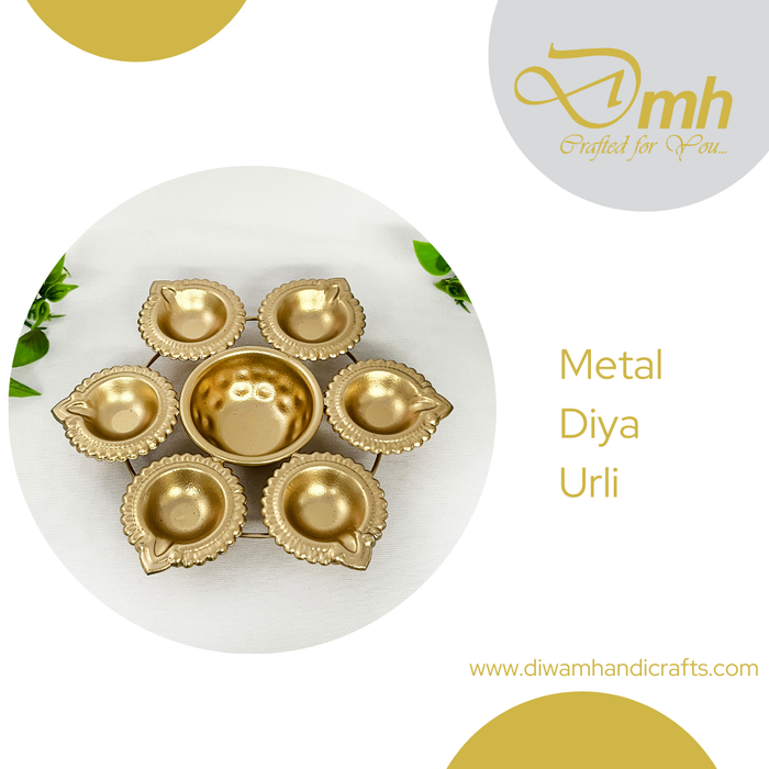 Elevate your Diwali celebrations with this exquisite metal diya urli