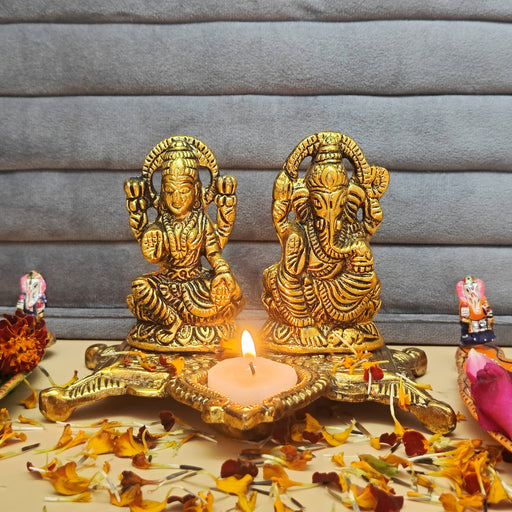 Shop Today Radiate prosperity with our Metal Laxmi & Ganesh Diya