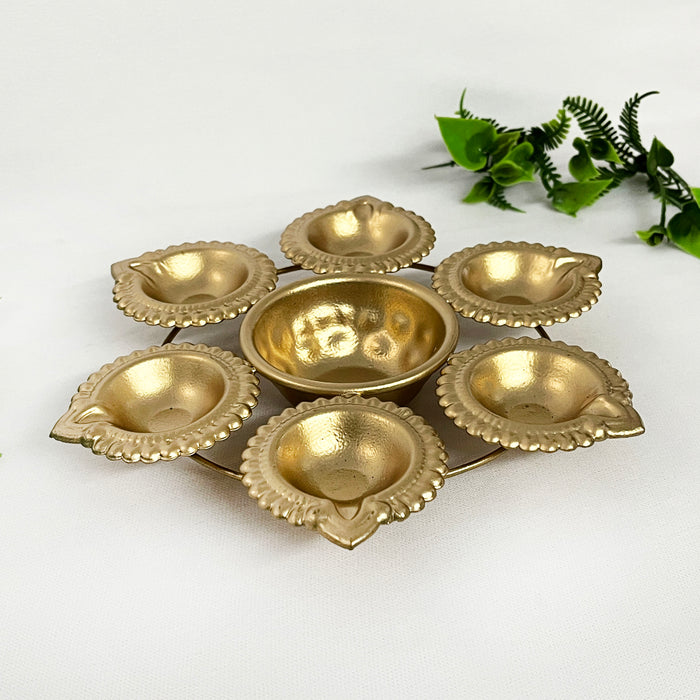 Elevate your Diwali celebrations with this exquisite metal diya urli