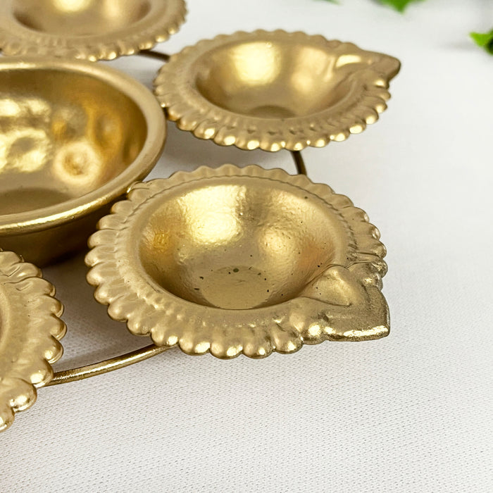 Elevate your Diwali celebrations with this exquisite metal diya urli