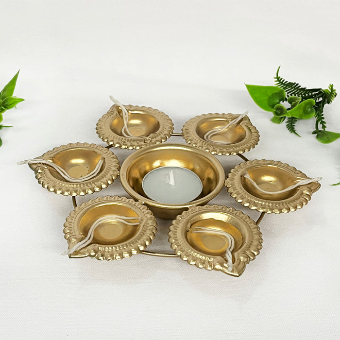 Elevate your Diwali celebrations with this exquisite metal diya urli