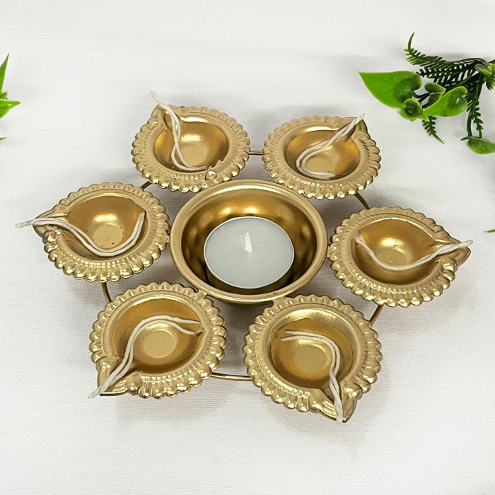 Elevate your Diwali celebrations with this exquisite metal diya urli