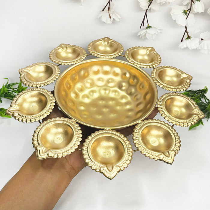 Elevate your Diwali celebrations with this exquisite metal diya urli