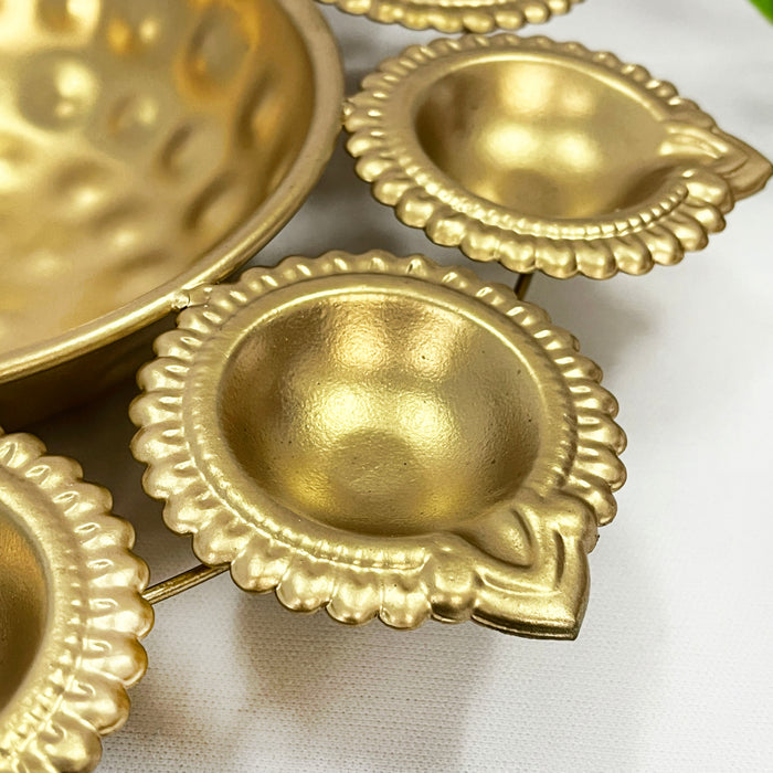 Elevate your Diwali celebrations with this exquisite metal diya urli