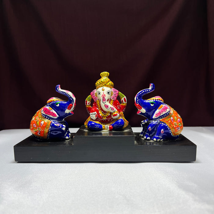 Lord Ganesha with Trunk Up Sitting Elephant Pair on Wooden Chowki