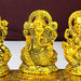 Metal Laxmi Ganesha Saraswati Idols with Diya on Leaf Chowki