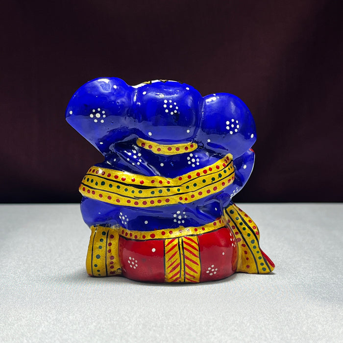 Handpainted Metal Ganesha Statue Sitting on Table 